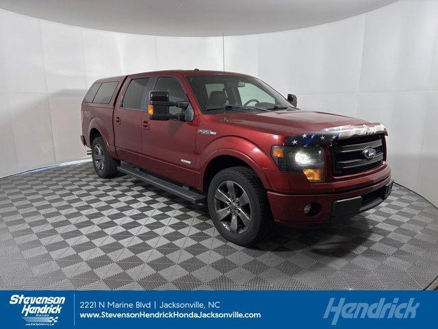 used 2014 Ford F-150 car, priced at $23,869