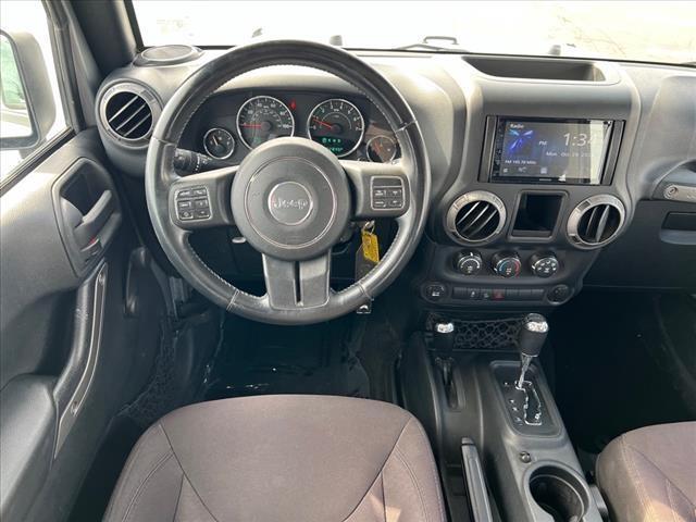 used 2015 Jeep Wrangler Unlimited car, priced at $17,597