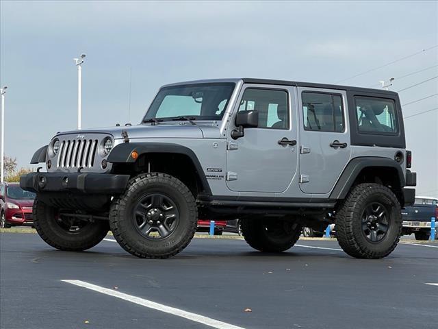 used 2015 Jeep Wrangler Unlimited car, priced at $17,597