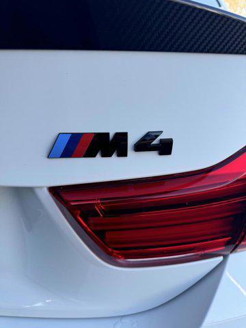 used 2018 BMW M4 car, priced at $54,729