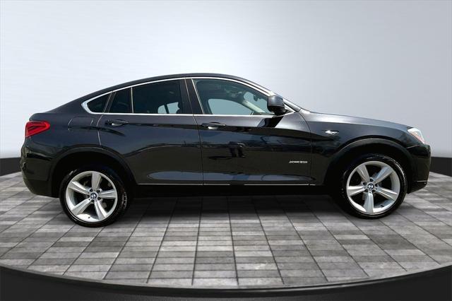 used 2016 BMW X4 car, priced at $15,349