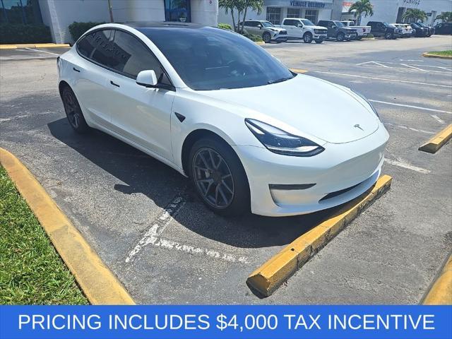 used 2023 Tesla Model 3 car, priced at $21,000