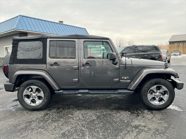 used 2018 Jeep Wrangler JK Unlimited car, priced at $22,997