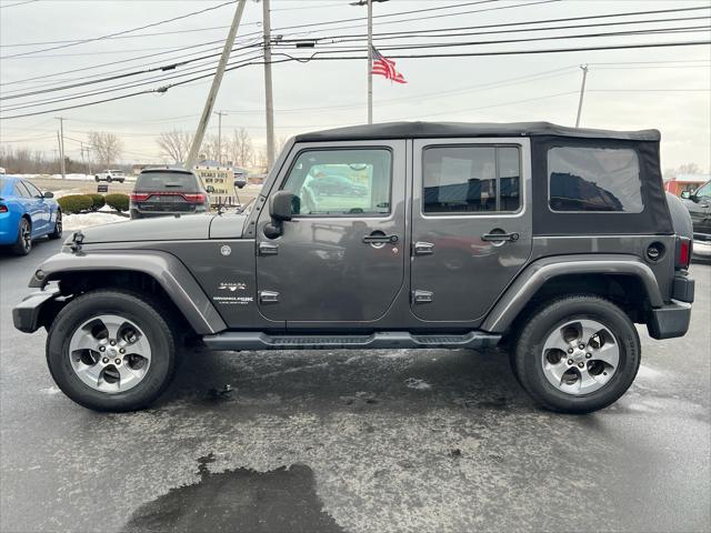 used 2018 Jeep Wrangler JK Unlimited car, priced at $22,997