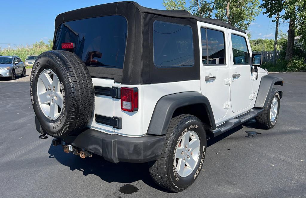 used 2015 Jeep Wrangler Unlimited car, priced at $18,997