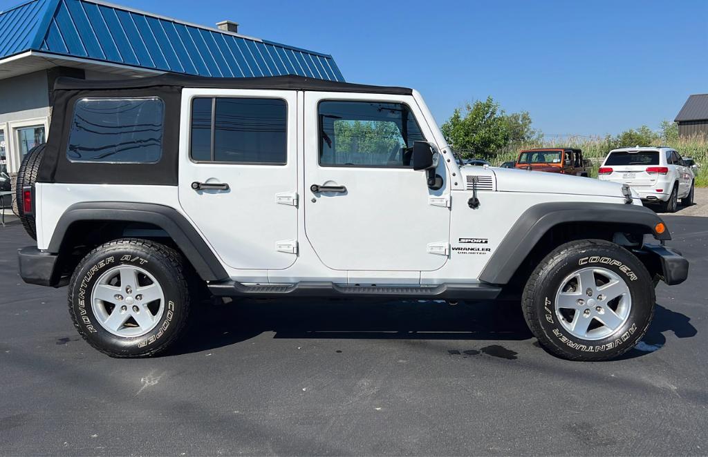 used 2015 Jeep Wrangler Unlimited car, priced at $18,997