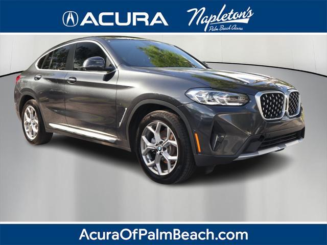 used 2023 BMW X4 car, priced at $38,900