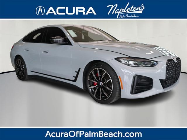 used 2023 BMW M4 car, priced at $51,998