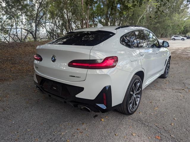 used 2022 BMW X4 car, priced at $35,900