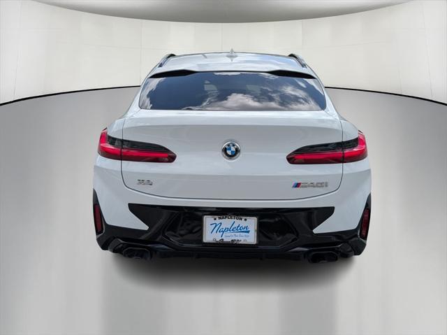 used 2023 BMW X4 car, priced at $46,900