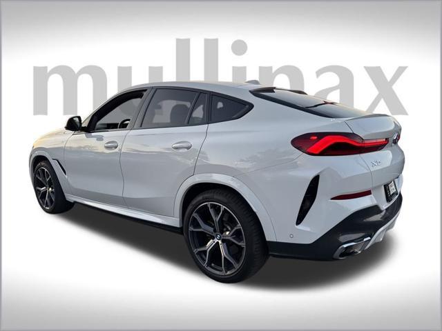 used 2024 BMW X6 car, priced at $59,900