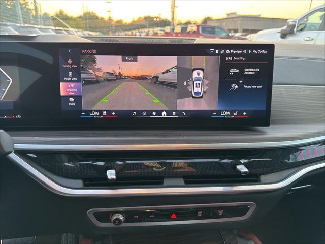 used 2024 BMW X6 car, priced at $59,900