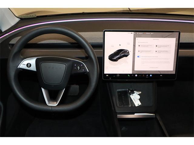 used 2024 Tesla Model 3 car, priced at $32,099
