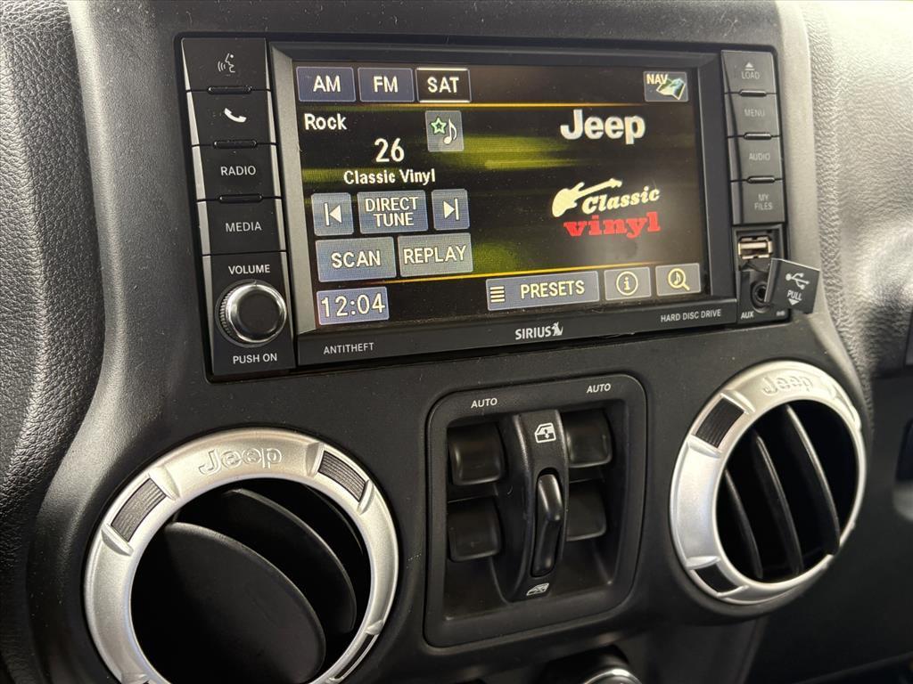 used 2015 Jeep Wrangler Unlimited car, priced at $16,039
