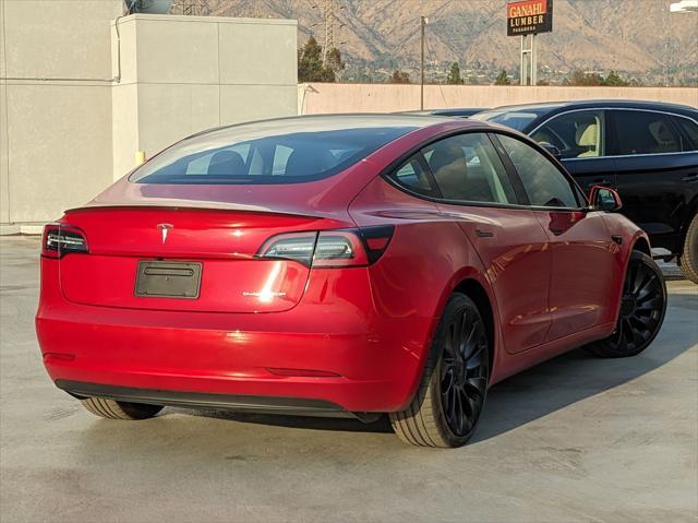 used 2022 Tesla Model 3 car, priced at $33,988