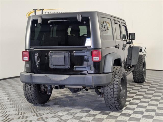 used 2015 Jeep Wrangler Unlimited car, priced at $18,171
