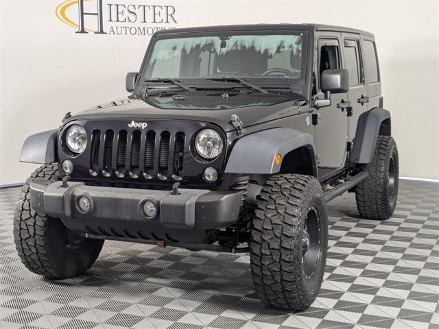used 2015 Jeep Wrangler Unlimited car, priced at $18,171