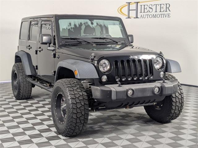 used 2015 Jeep Wrangler Unlimited car, priced at $18,171
