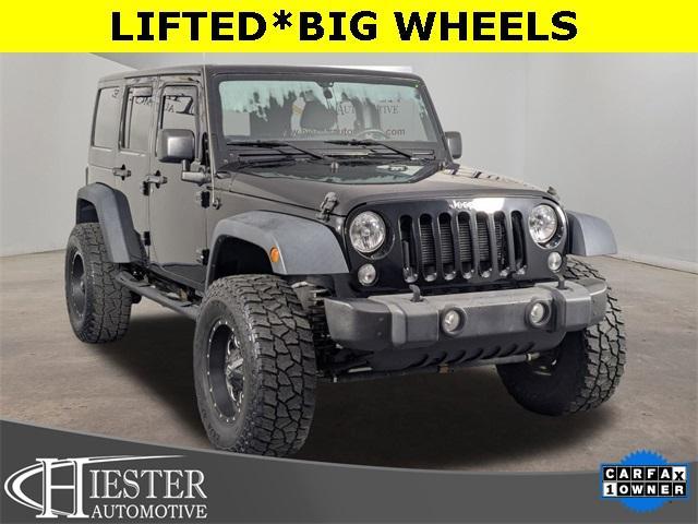 used 2015 Jeep Wrangler Unlimited car, priced at $18,171