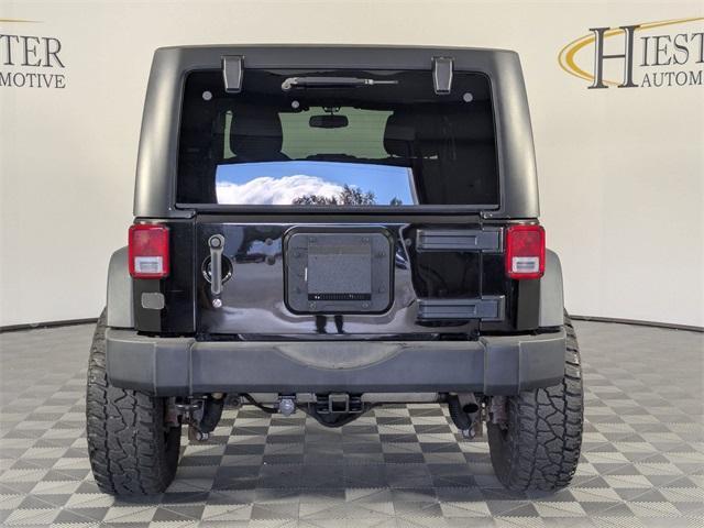 used 2015 Jeep Wrangler Unlimited car, priced at $18,171