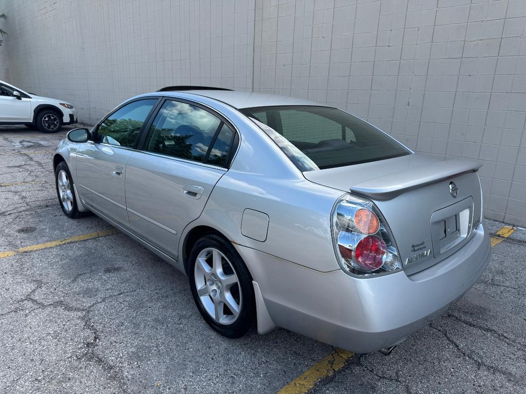 used 2004 Nissan Altima car, priced at $4,999