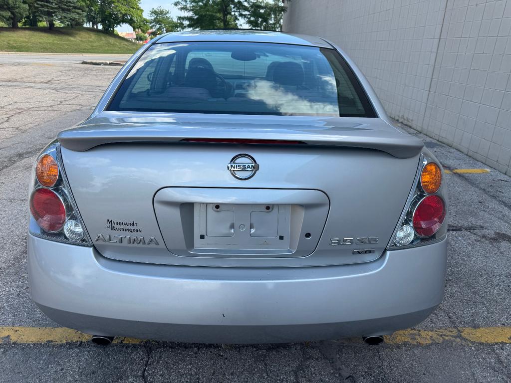 used 2004 Nissan Altima car, priced at $4,999