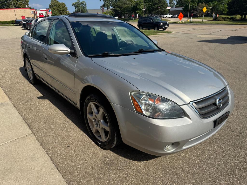used 2004 Nissan Altima car, priced at $4,999
