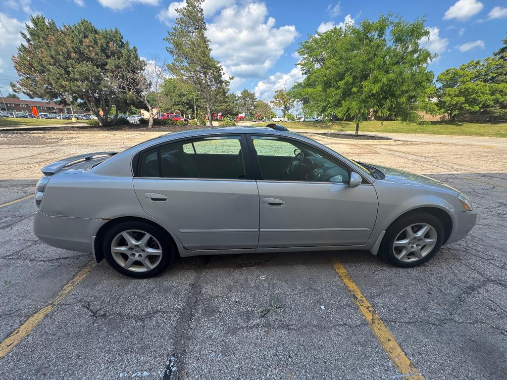 used 2004 Nissan Altima car, priced at $4,999
