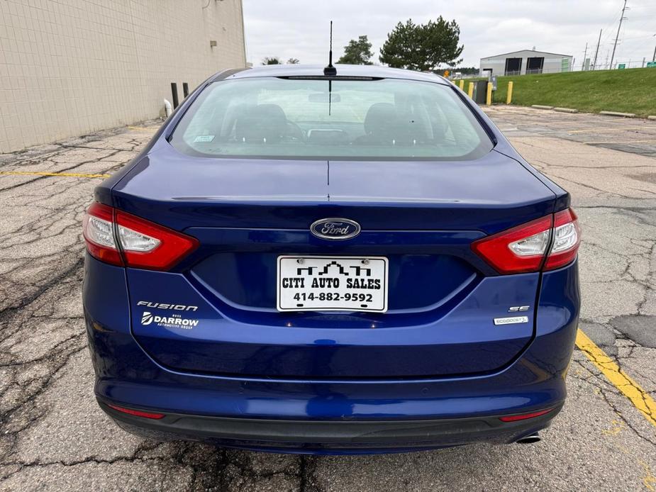 used 2014 Ford Fusion car, priced at $10,999