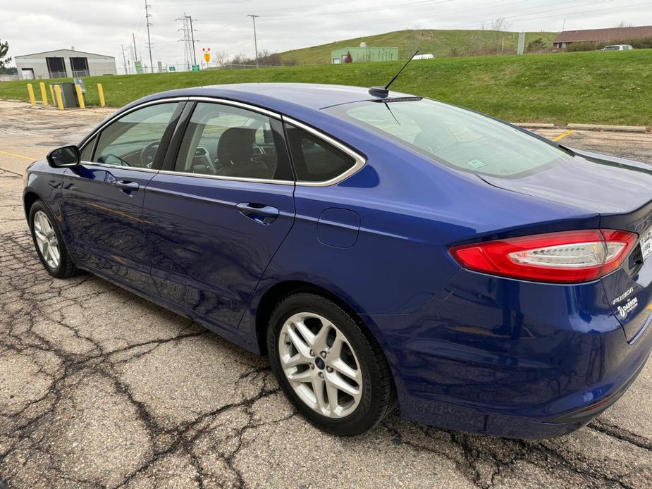 used 2014 Ford Fusion car, priced at $10,999