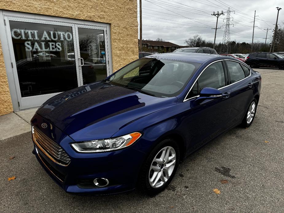 used 2014 Ford Fusion car, priced at $10,999