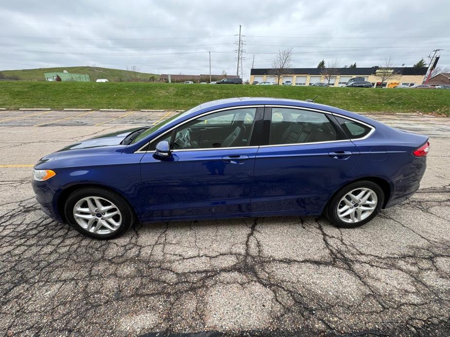 used 2014 Ford Fusion car, priced at $10,999