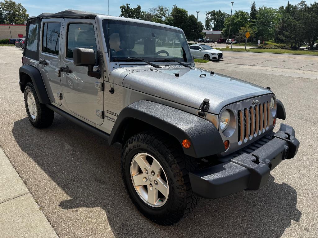 used 2013 Jeep Wrangler Unlimited car, priced at $11,999