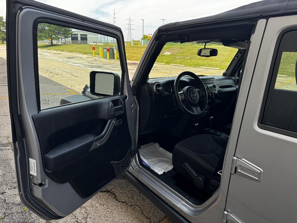 used 2013 Jeep Wrangler Unlimited car, priced at $11,999