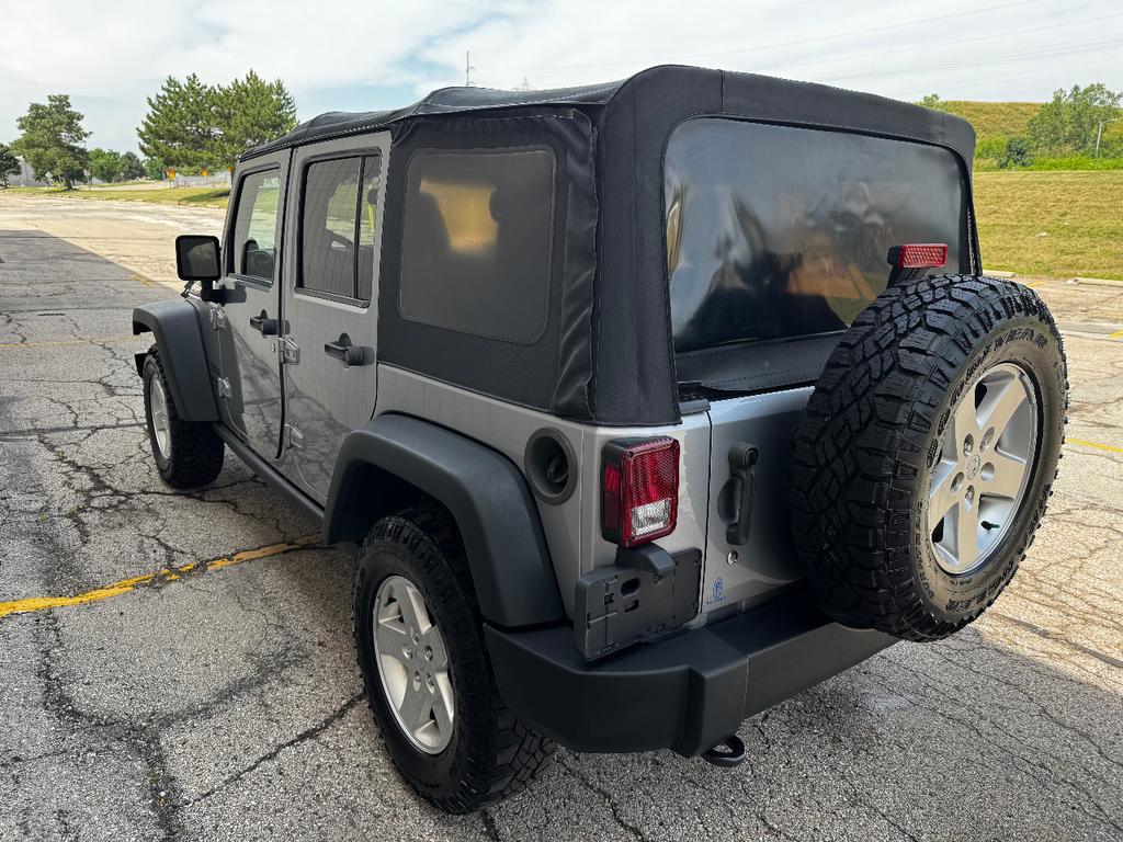 used 2013 Jeep Wrangler Unlimited car, priced at $11,999