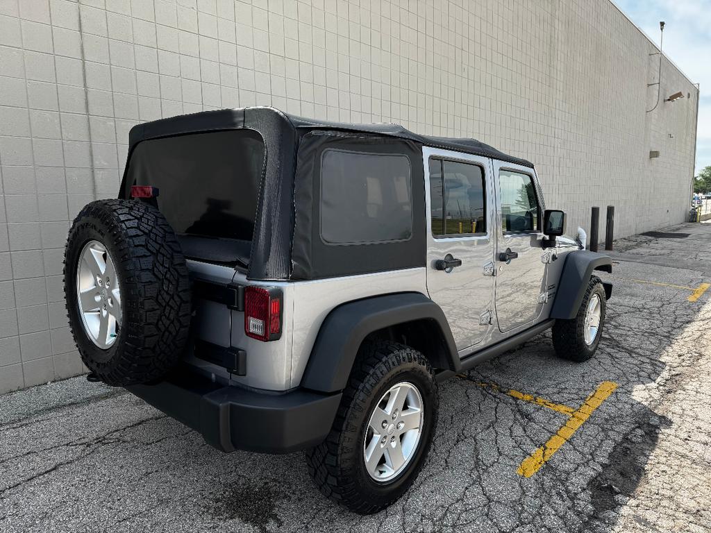 used 2013 Jeep Wrangler Unlimited car, priced at $11,999