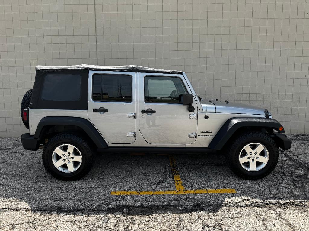 used 2013 Jeep Wrangler Unlimited car, priced at $11,999