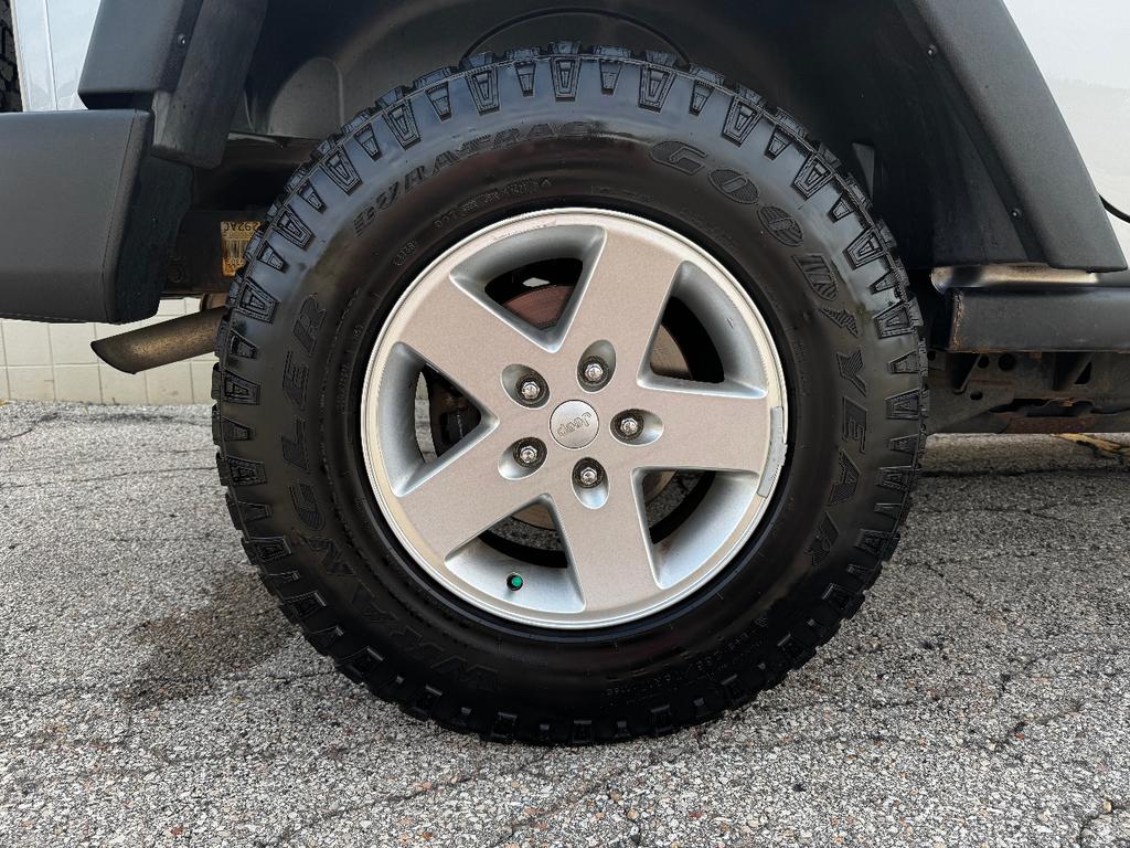 used 2013 Jeep Wrangler Unlimited car, priced at $11,999