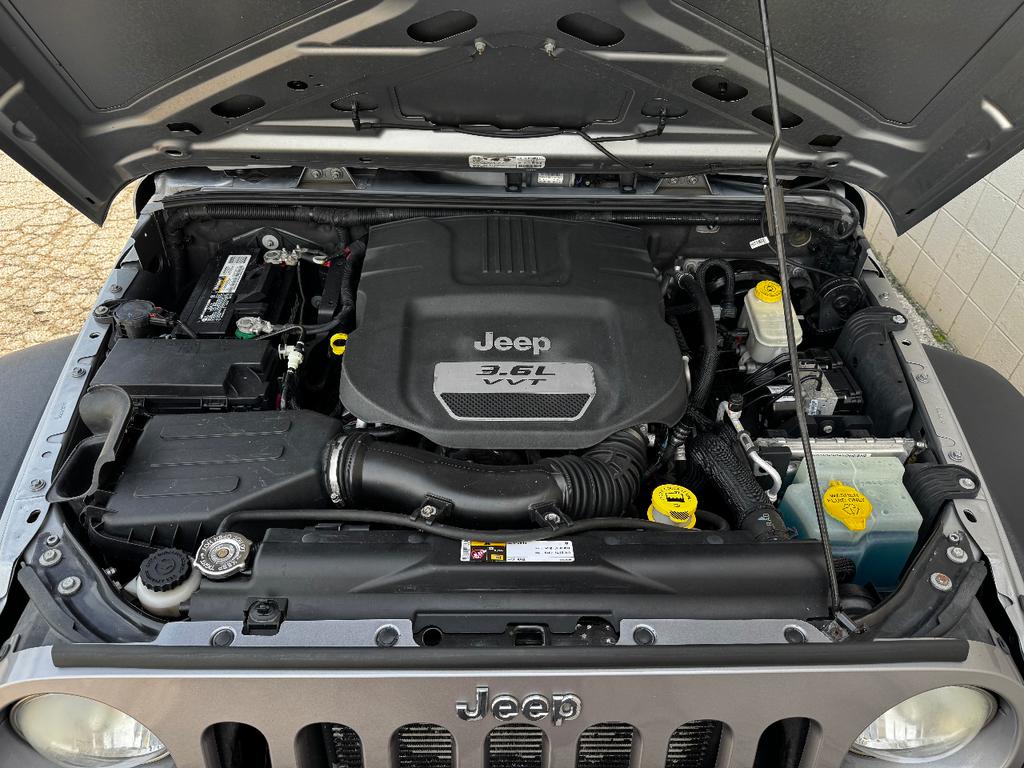 used 2013 Jeep Wrangler Unlimited car, priced at $11,999