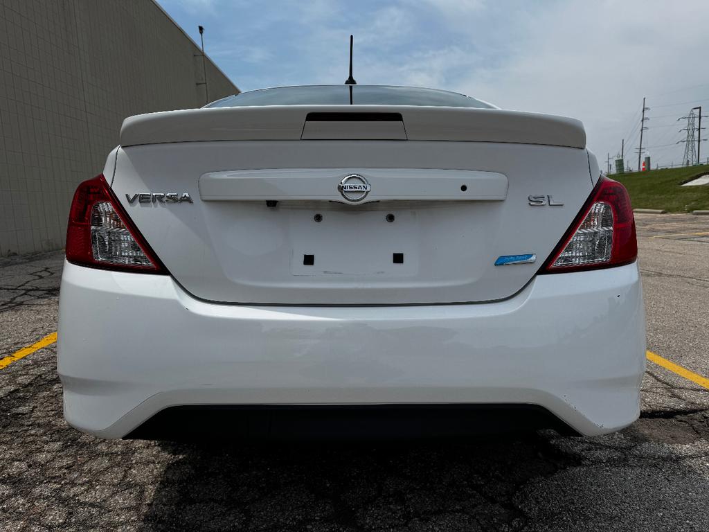 used 2015 Nissan Versa car, priced at $8,999