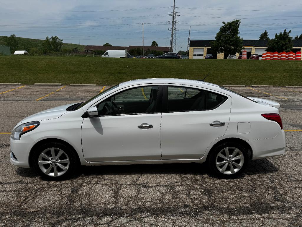 used 2015 Nissan Versa car, priced at $8,999