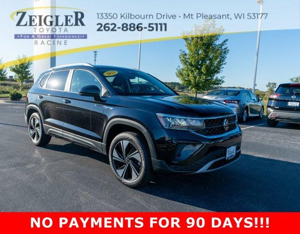 used 2023 Volkswagen Taos car, priced at $24,595