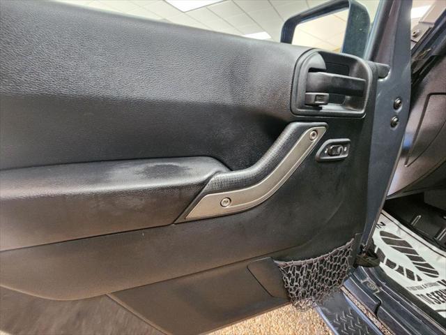 used 2016 Jeep Wrangler Unlimited car, priced at $13,391