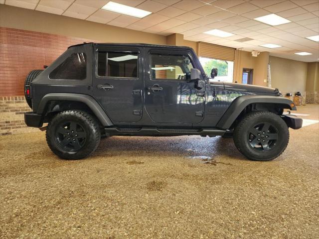 used 2016 Jeep Wrangler Unlimited car, priced at $13,391