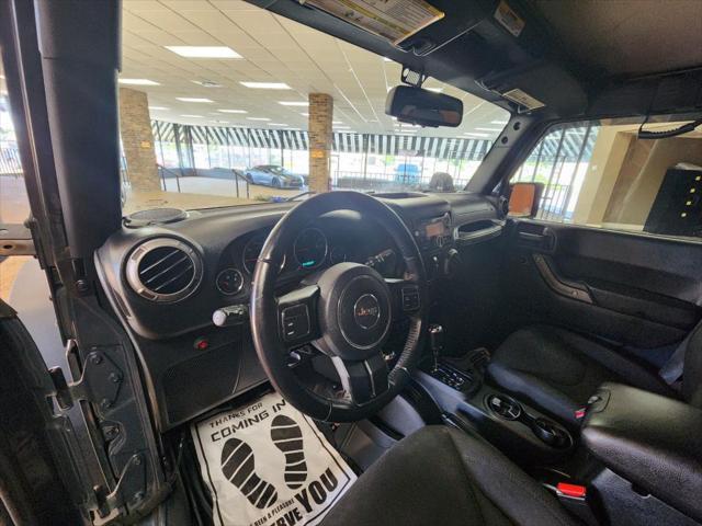used 2016 Jeep Wrangler Unlimited car, priced at $13,391