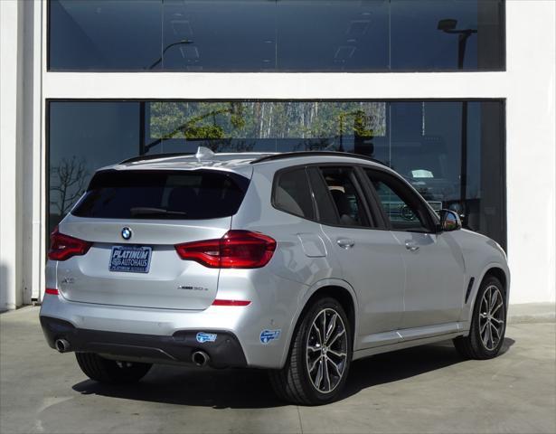 used 2021 BMW X3 PHEV car, priced at $27,488