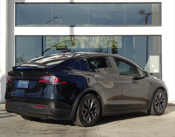 used 2023 Tesla Model X car, priced at $64,888