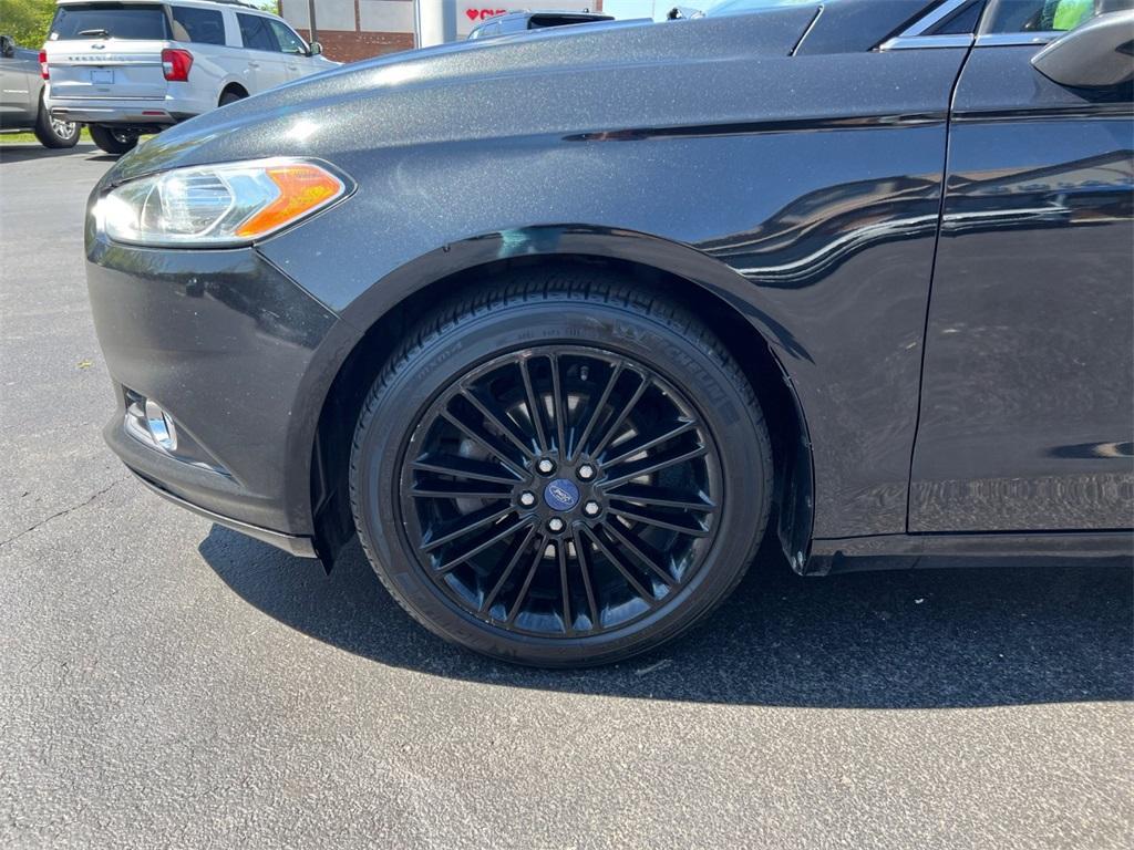 used 2014 Ford Fusion car, priced at $6,000