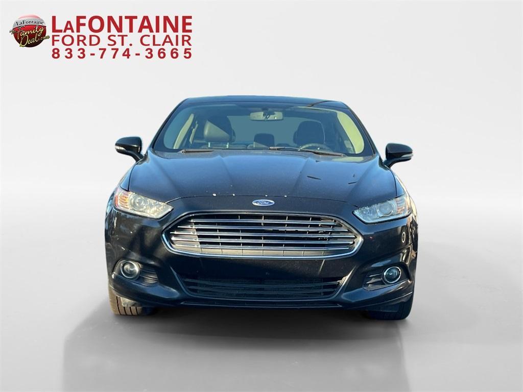 used 2014 Ford Fusion car, priced at $6,000
