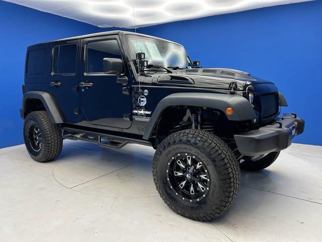 used 2015 Jeep Wrangler Unlimited car, priced at $27,495